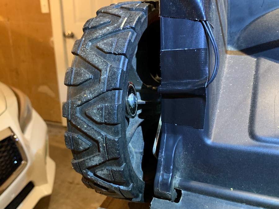 Reed switch mounted next to wheel.